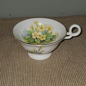 Vibrant Yellow and Green Glass Art with Floral Motif